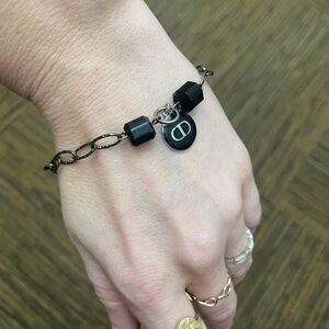 silver bracelet with designer charm handmade